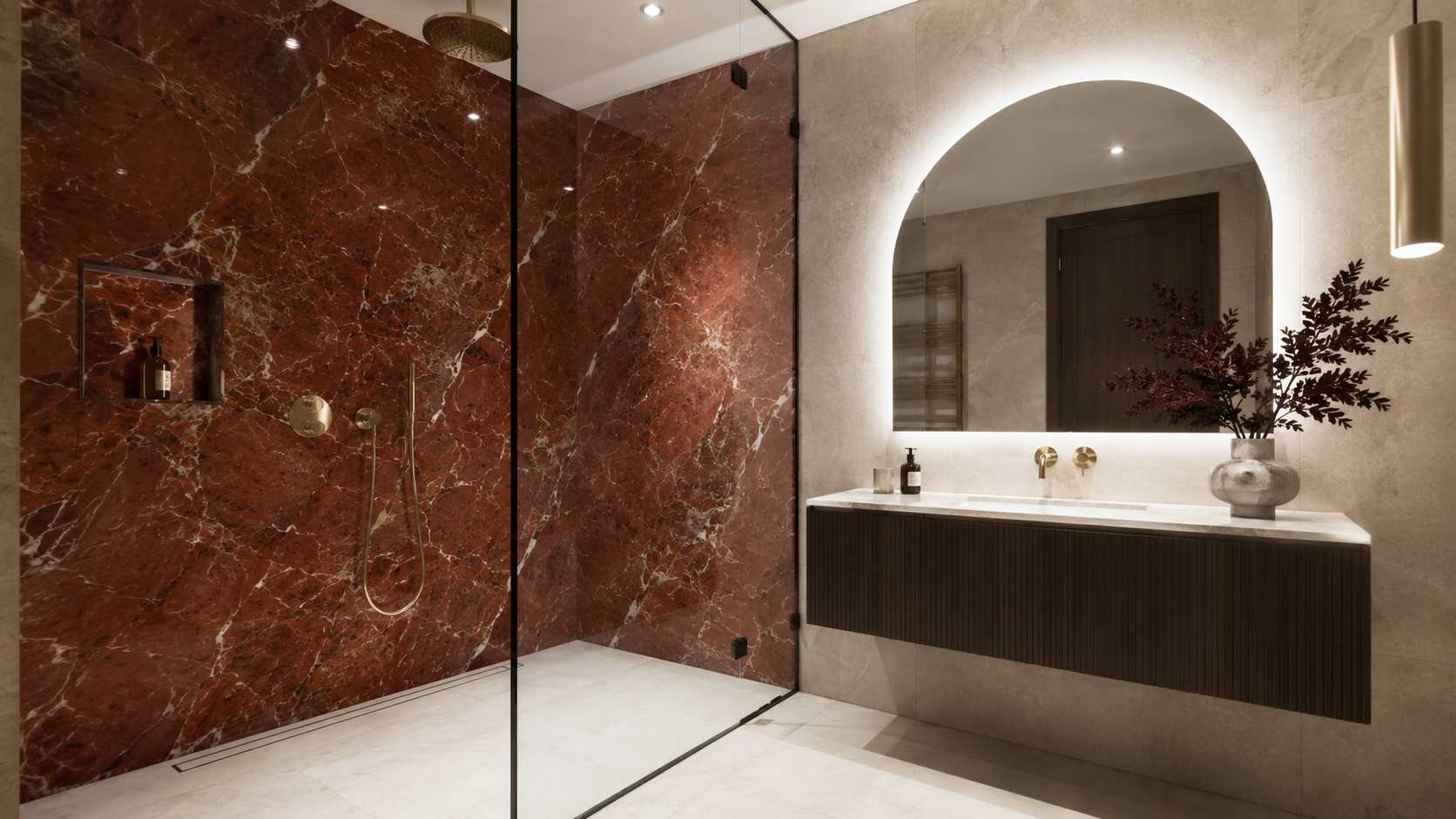 Red marble shower feature wall paired with a minimalist floating vanity